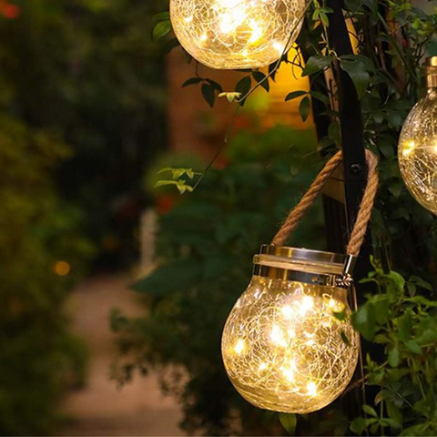 Lampă solară LED suspendată într-un copac, glob din sticlă vintage iluminat pe timp de noapte, led-box.ro
